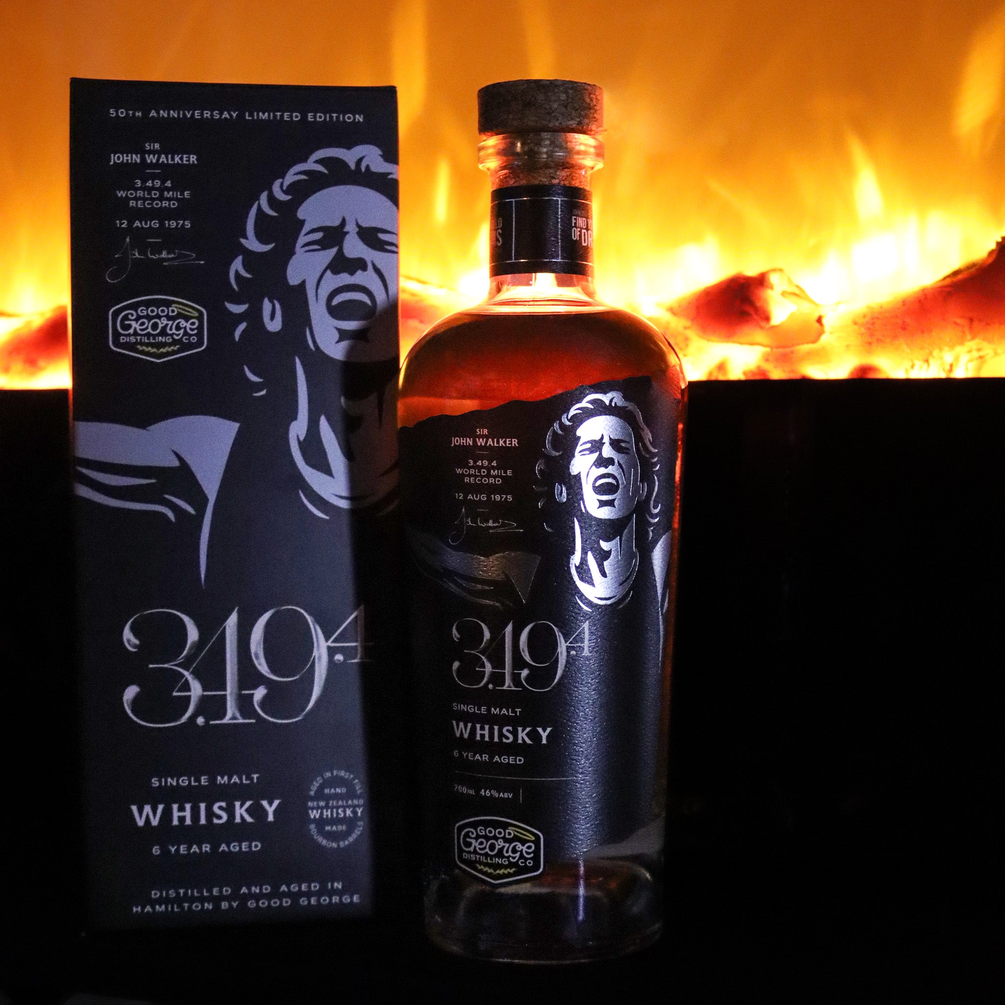 Bottle and box 3. 49.4 whisky against a warm, blurred background