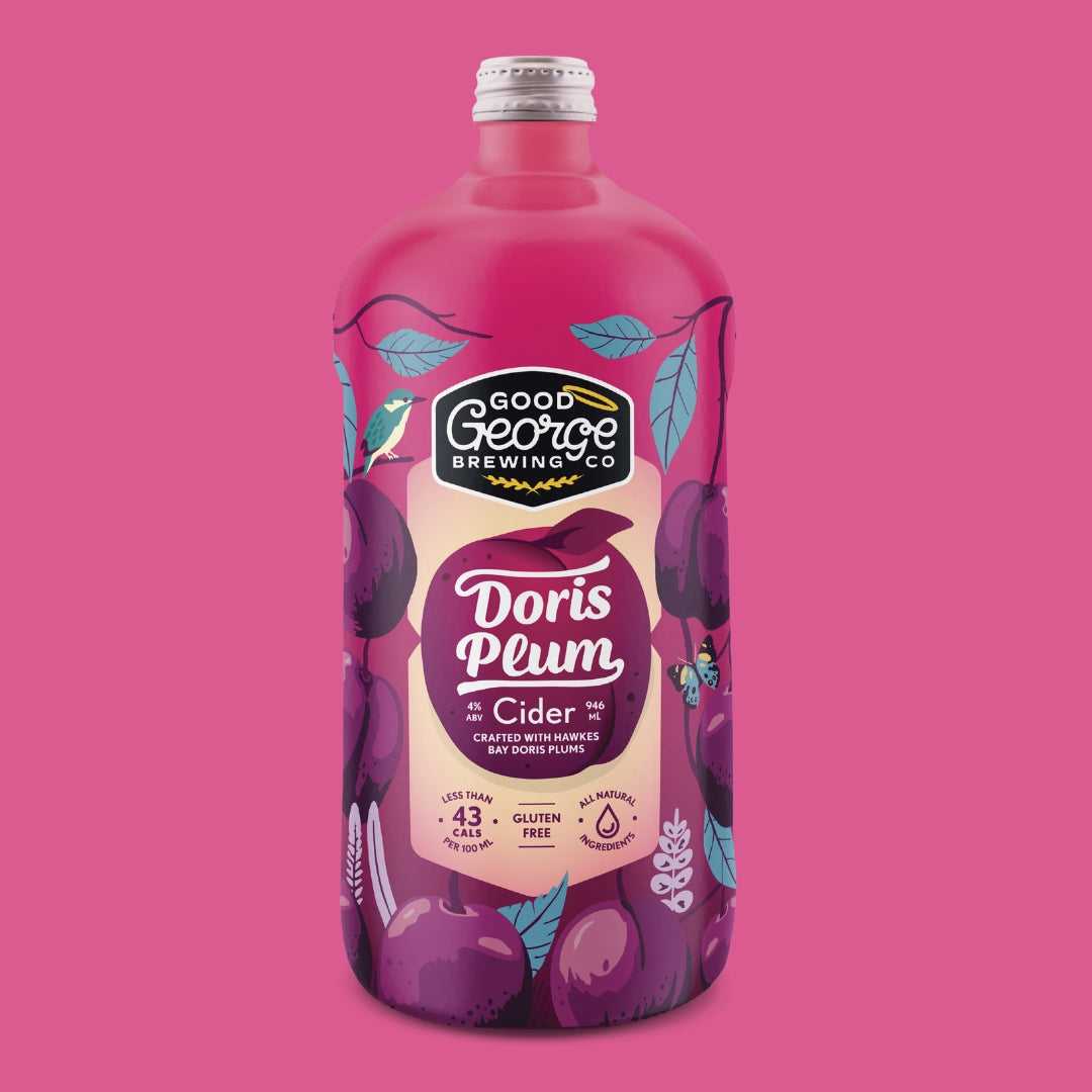 A bottle of Doris Plum Cider with a magenta label featuring illustrations of plums and leaves, text detailing the cider brand and variety.
