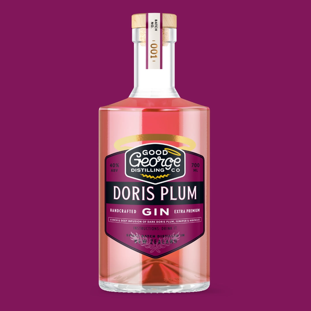 Bottle of Good George Distilling Co. Doris Plum Gin on a purple background