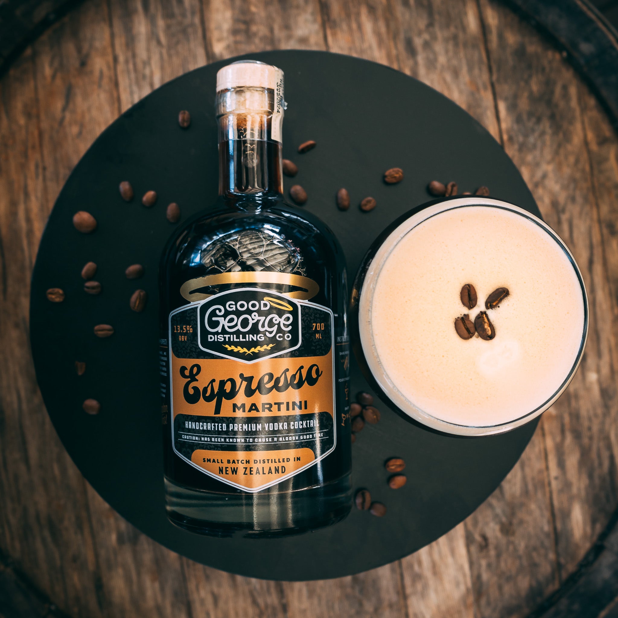 Bottle of Good George Espresso Martini and espresso martini from a top down angle