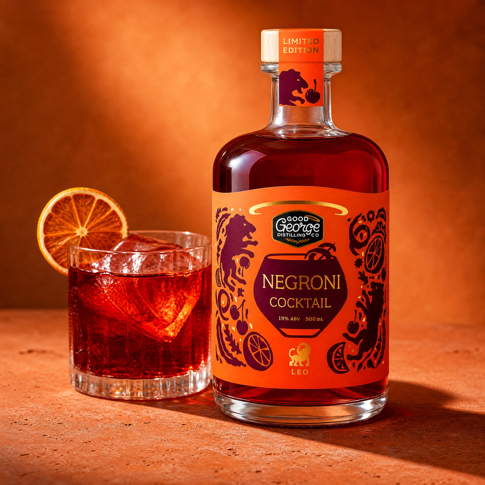 Bottle of Limited Edition Negroni Cocktail with a glass of the cocktail on a wooden surface.