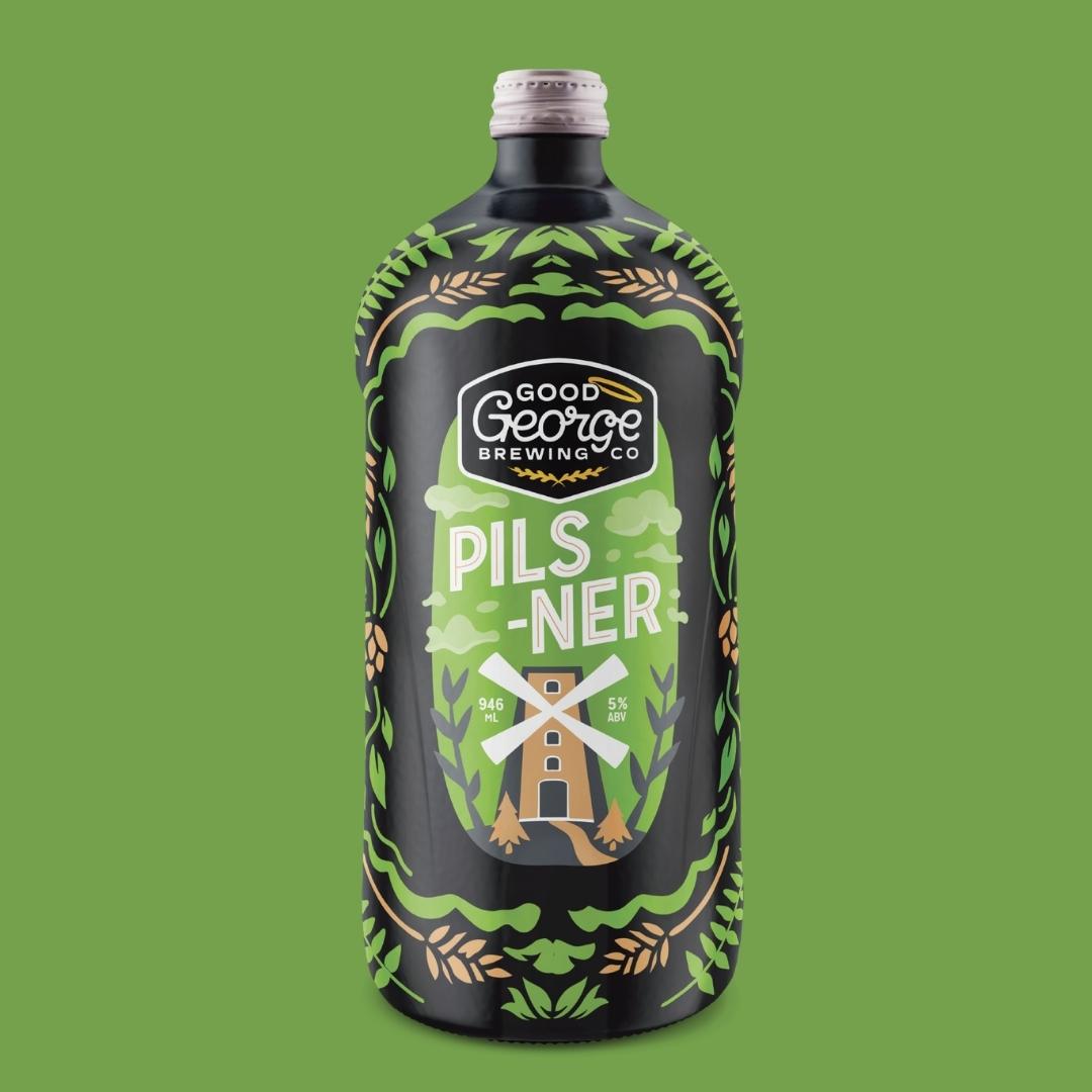 A bottle of 'Pilsner' beer with a label featuring a windmill and floral patterns.