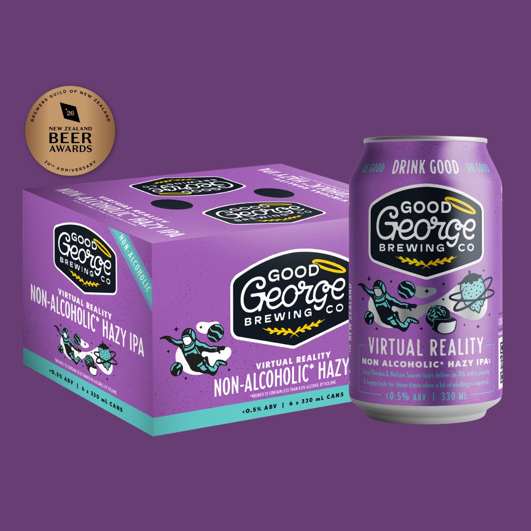 A purple and teal beverage box and matching can from Good George Brewing Co. featuring the 'Virtual Reality Non-Alcoholic Hazy IPA' label, shown on a solid purple background with a bronze award seal in the top left.