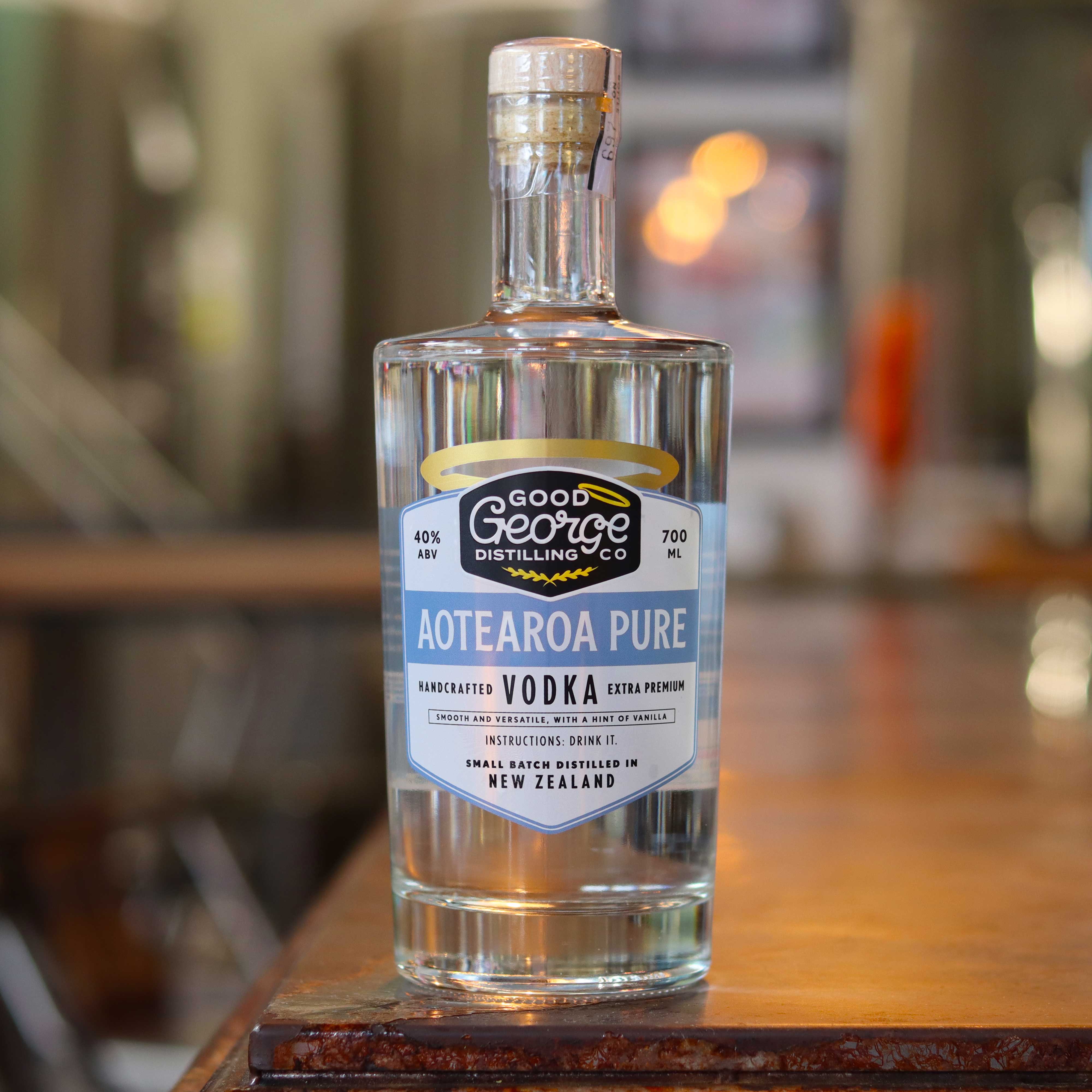 A bottle of Aotearoa Pure Vodka by Good George Distilling Co. with a white label and gold accents on the bar