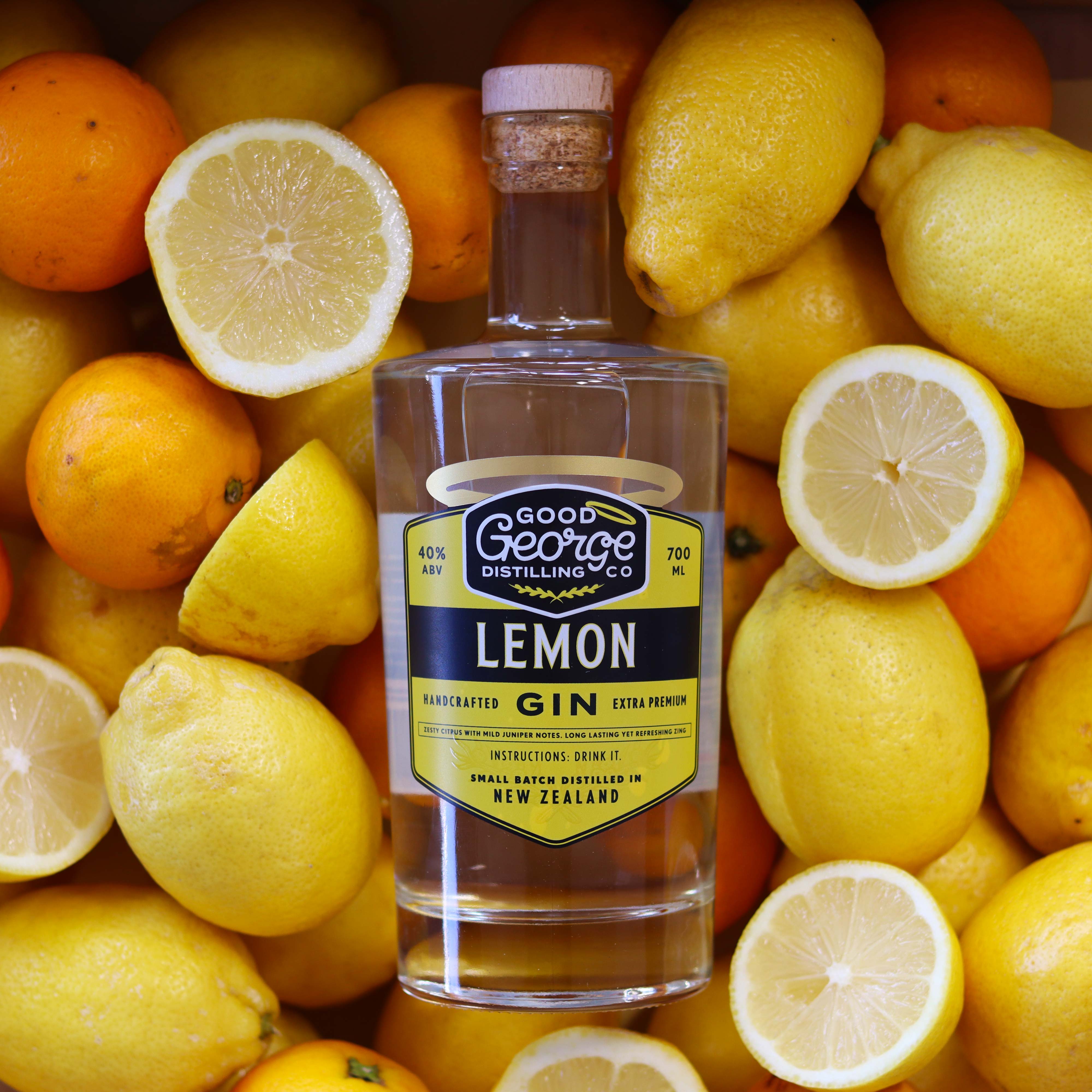 Good George Lemon Gin 700ml Bottle surrounded by lemons