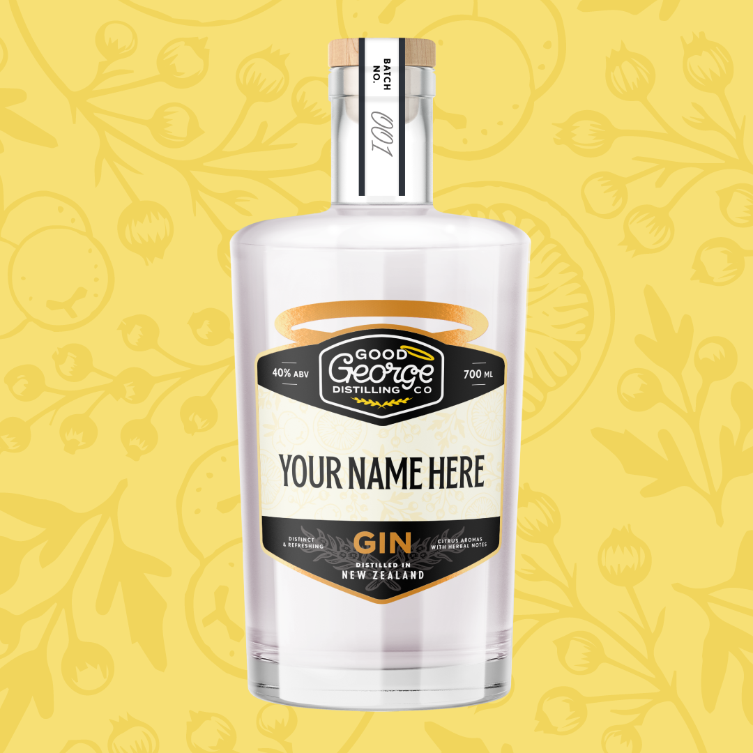 Clear gin bottle with a customizable label on a yellow patterned background