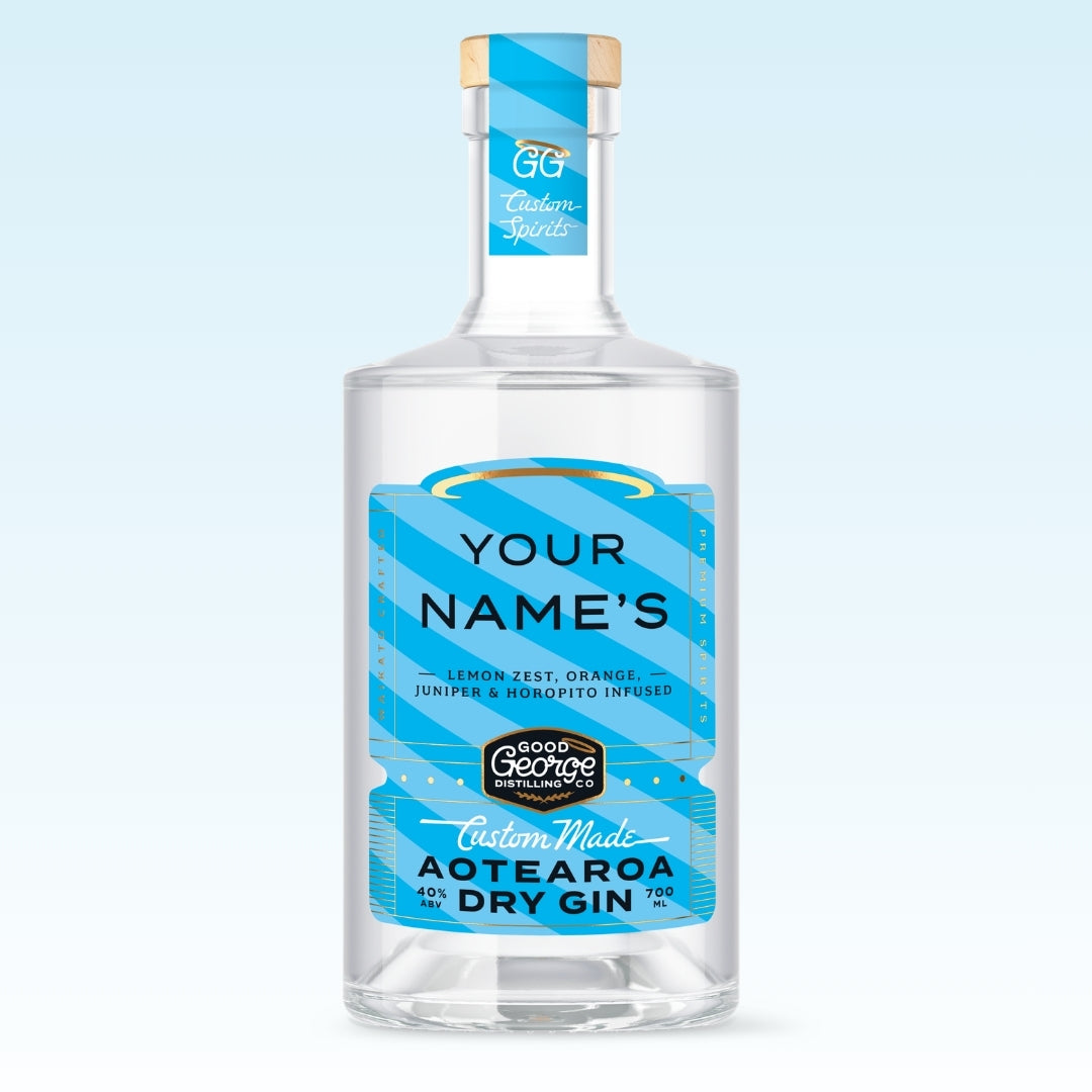 Bottle of Good George Aotearoa Dry Gin with a custom label on a light blue background