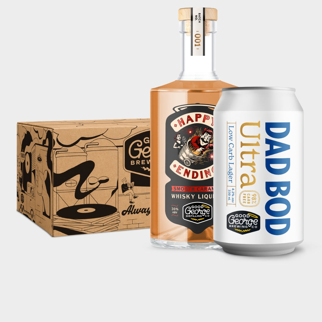 A bottle of George Brewing Happy Ending Whisky Liquor next to a white can of Dad Bod Ultra craft beer, with a brown cardboard shipping box featuring black illustrations in the background, all on a light gray studio background.