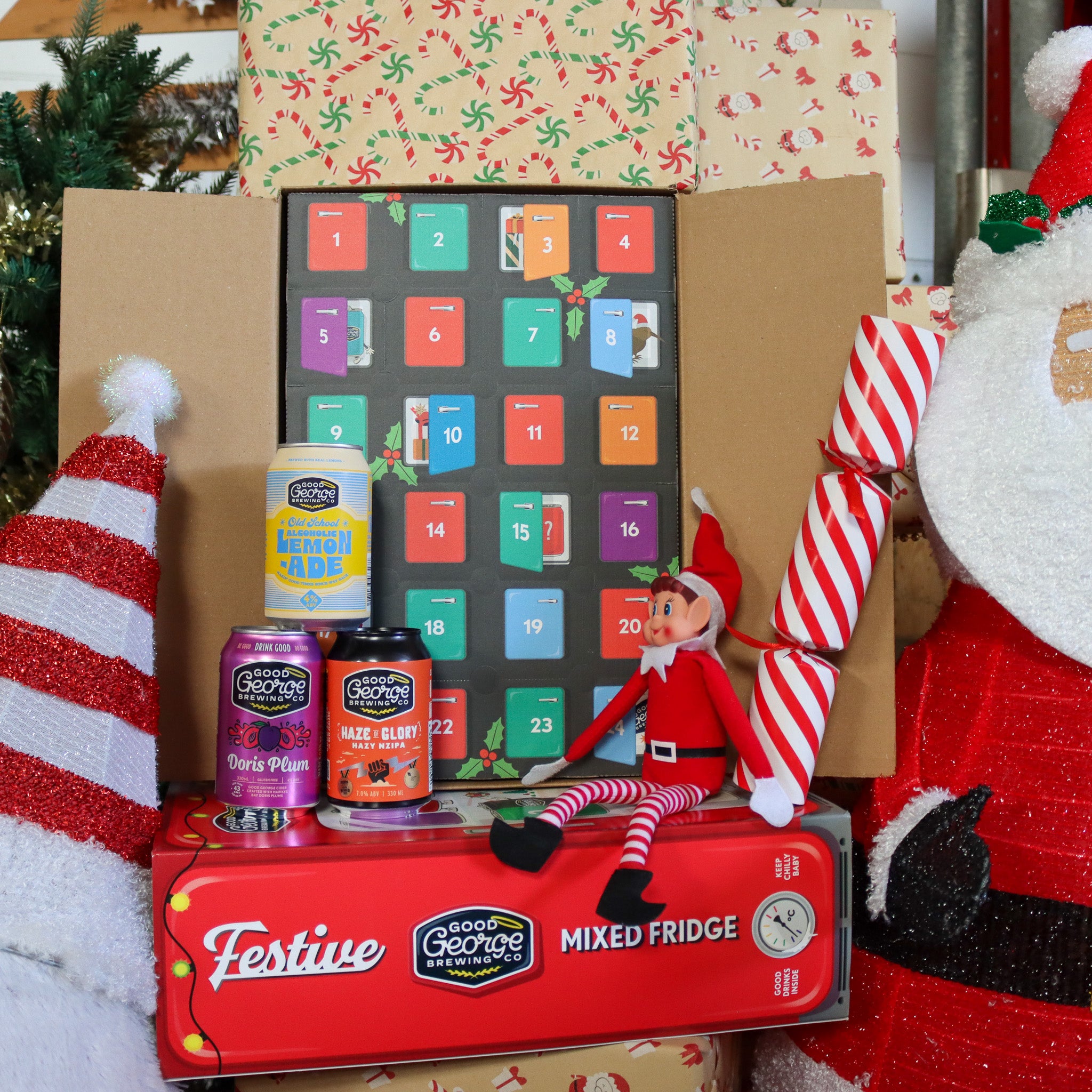 Festive mixed fridge with advent calendar and mini drinks in a Christmas-themed setting
