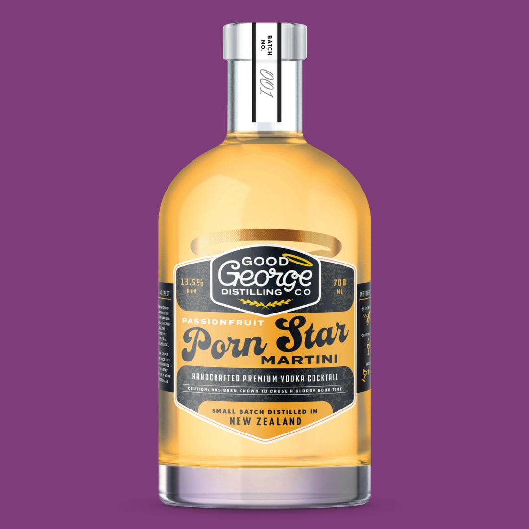 Bottle of Good George Distilling Co. Porn Star Martini on a purple background