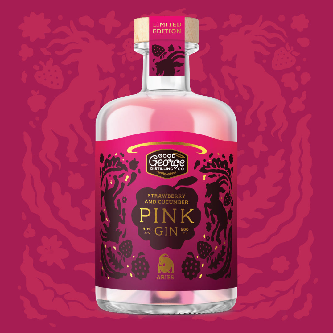 Bottle of Good George Strawberry and Cucumber Pink Gin on a pink background