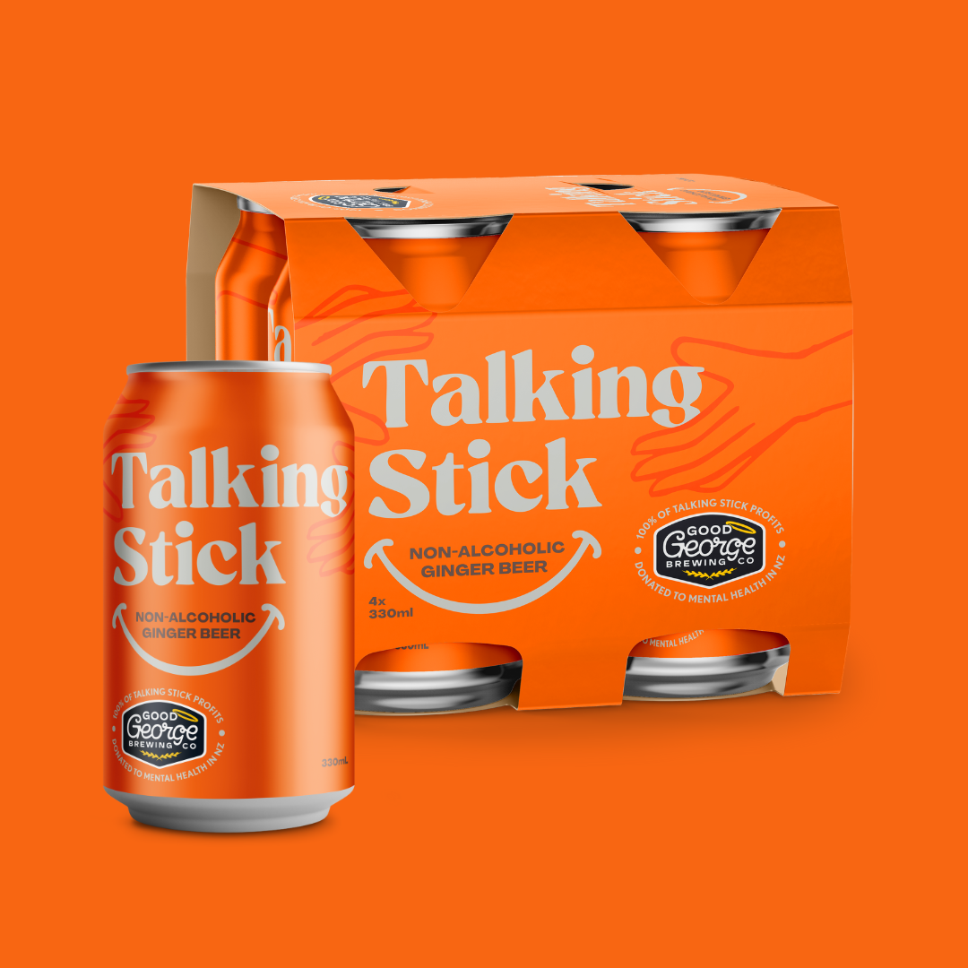 Six-pack of Talking Stick non-alcoholic ginger beer on an orange background