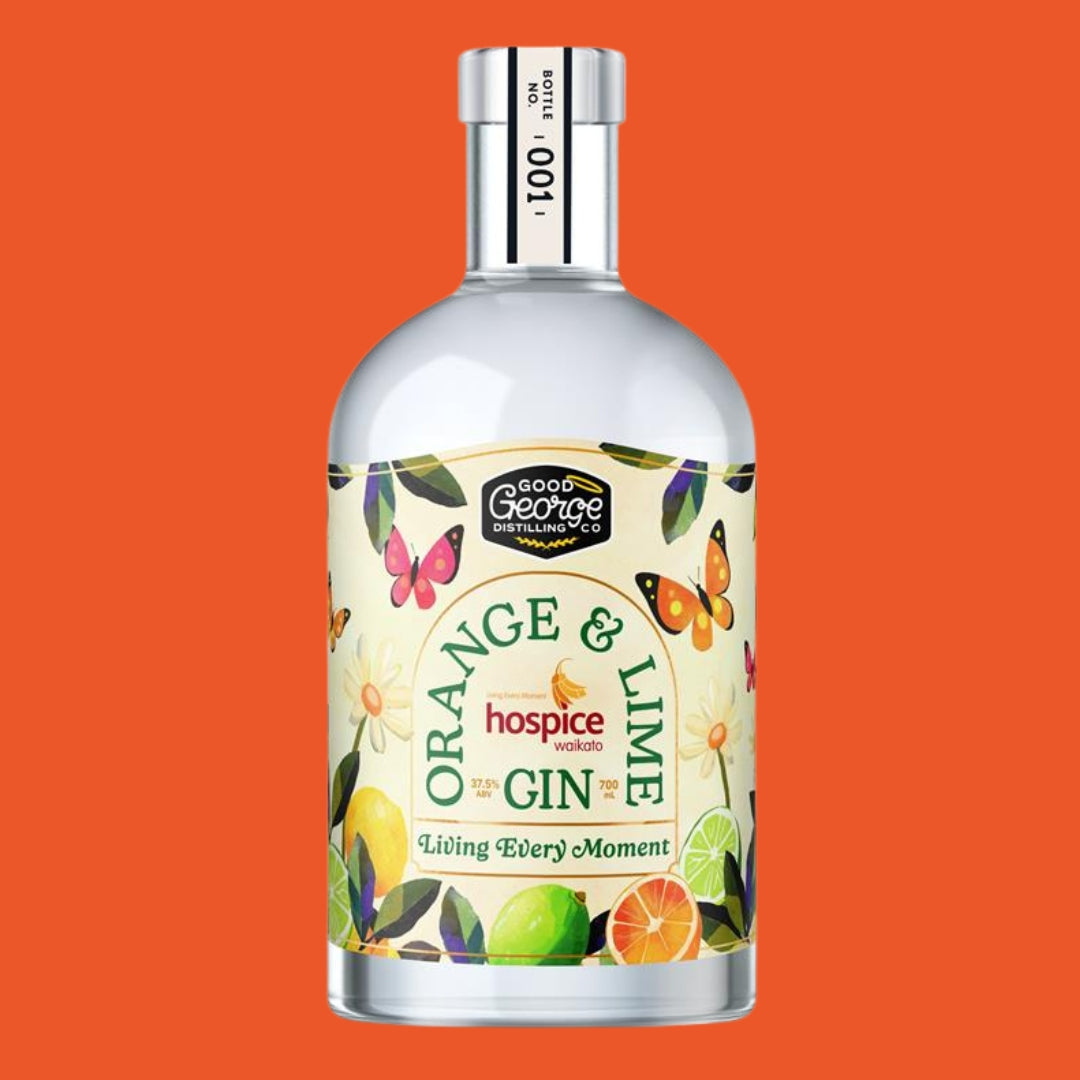 Bottle of Orange & Lime Gin with a colorful label on an orange background