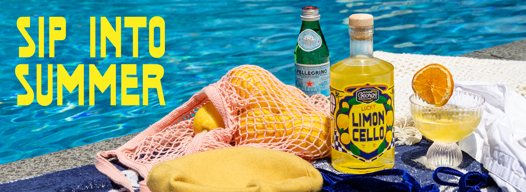 Limoncello bottle, lemon, and cocktail by a pool with 'Sip into Summer' text.