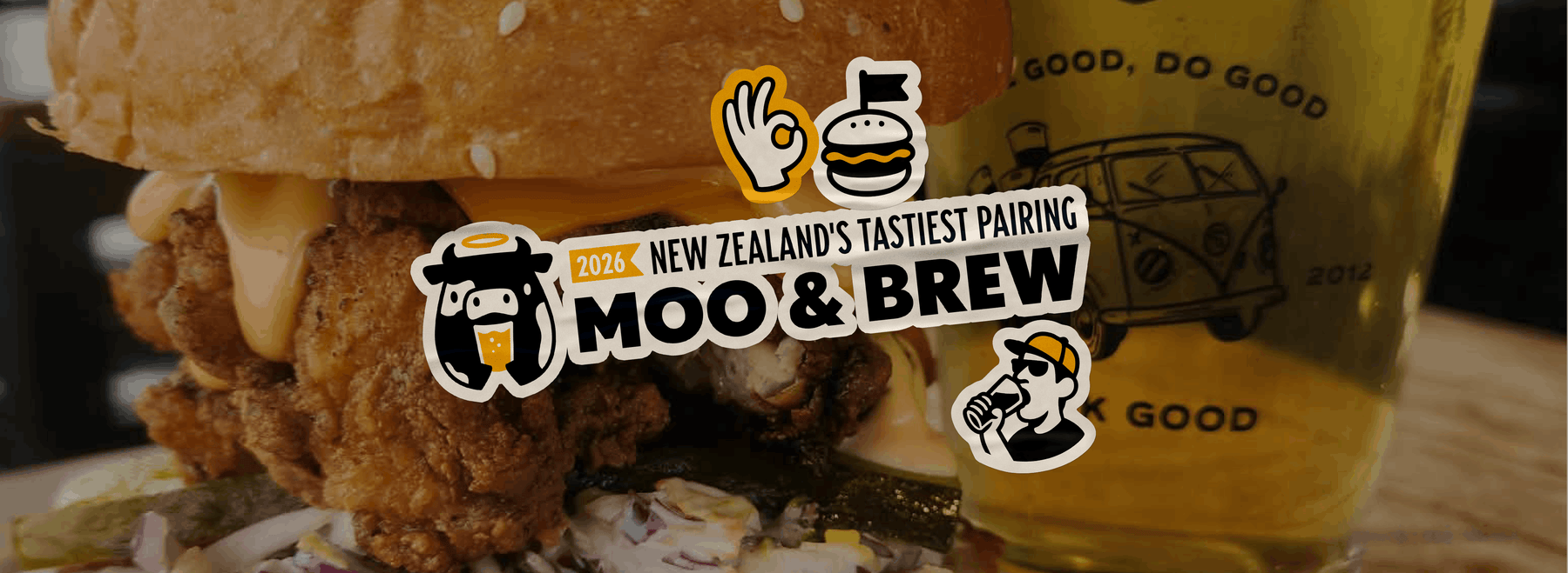 A close-up promotional graphic featuring a large burger with fried chicken and cheese, a pint of beer, and a sticker-style logo reading 'Moo & Brew' with '2026 New Zealand's Tastiest Pairing.' This is not a clean standalone product shot and not a person-centered lifestyle image, so the best fit is Other.