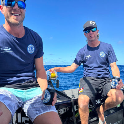 Matt and co holding cans of Sword Fish Mojo