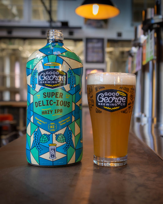 Good George Super Delic-Ious Hazy IPA Squealer 946ml Bottle and a glass of Good George Super Delic-Ious Hazy IPA next to it