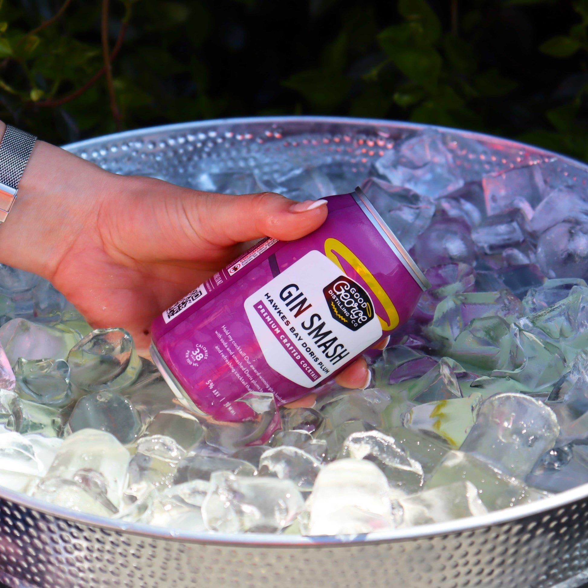 Good George Gin Smash Can getting grabbed out of the ice bucket